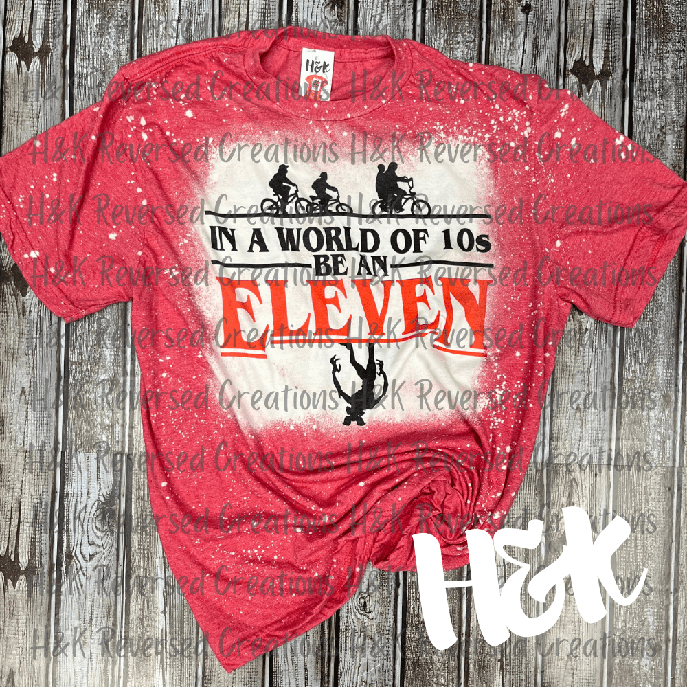 In A World Of 10s Be An Eleven, Red Bleached T Shirt - H&K Reversed Creations 